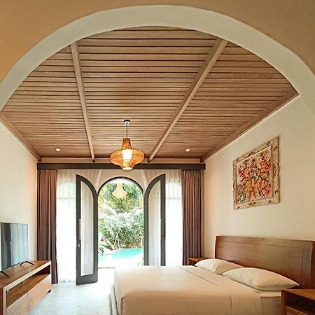 Отель Casa De Ozora Munggu Экстерьер фото